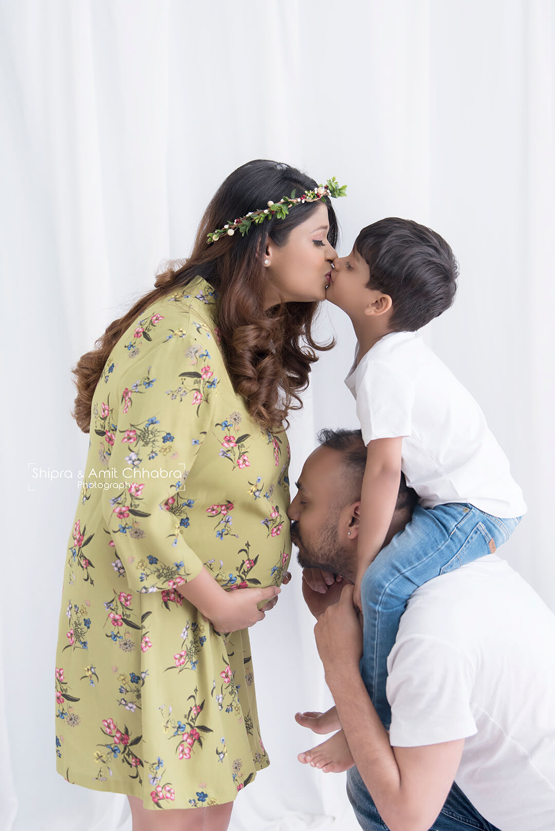 Indian couple posing for Maternity shoot pose for welcoming new born baby  in Lodhi Road in Delhi India, Maternity photo shoot done by parents for  welcoming their child, Pre Baby Photo Shoot